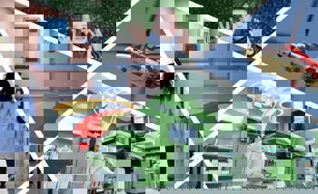 Κολάζ φωτογραφιών που δείχνουν μια γυναίκα γιατρό να περπατάει στον διάδρομο ενός νοσοκομείου, μια γωνία από τον εσωτερικό χώρο ενός νοσοκομείου, ένα μικρό αγοράκι να σηκώνει τα χέρια ψηλά, ένα ελικόπτερο ΕΚΑΒ και το εσωτερικό ενός εργαστηριακούθ δωματίου σε ένα νοσοκομείο με ένα ιατρικό μηχάνημα